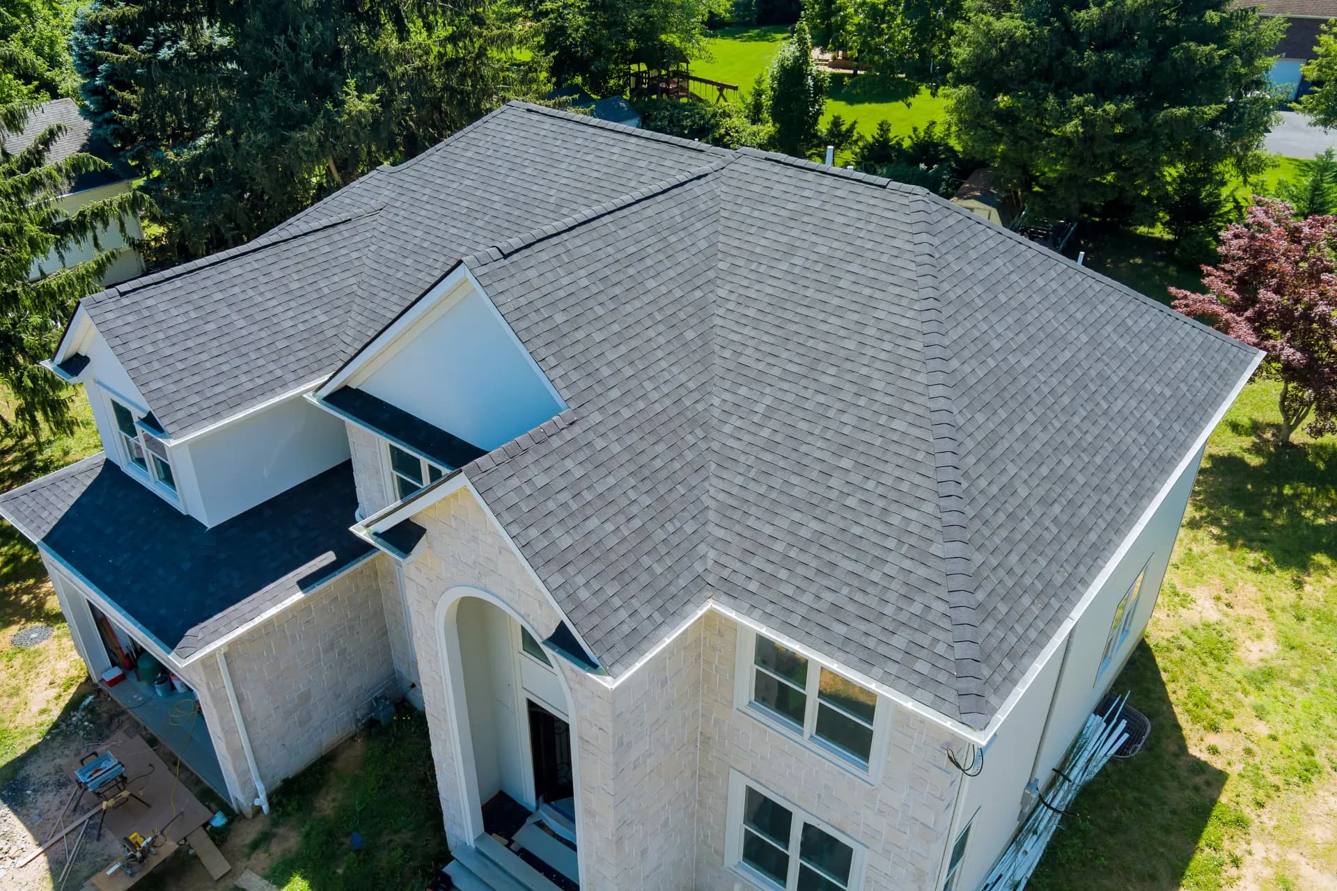 An aerial view of the roof of a white house.